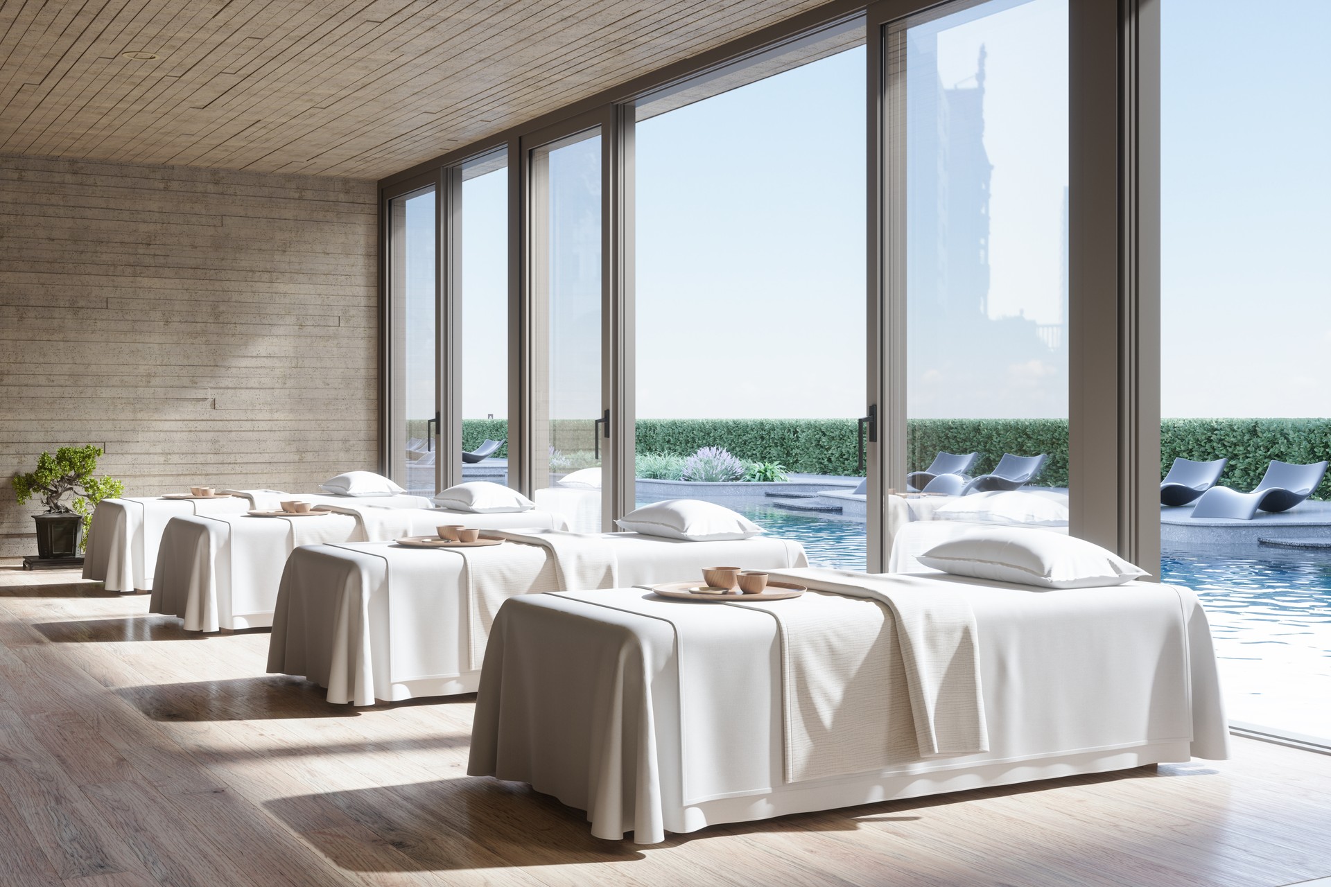 Spa Massage Room Interior With Massage Tables, Parquet Floor And Pool View Through The Window